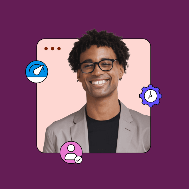 Smiling man in a blazer with glasses against a colorful background.